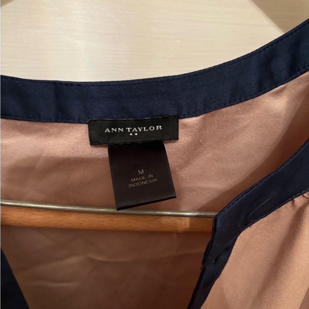 Beige with a blue colar line women medium shirt/blouse by Ann Taylor.